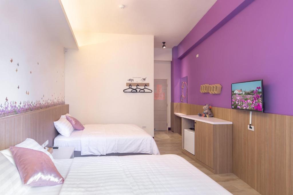 Postel nebo postele na pokoji v ubytování Sanwu Homestay