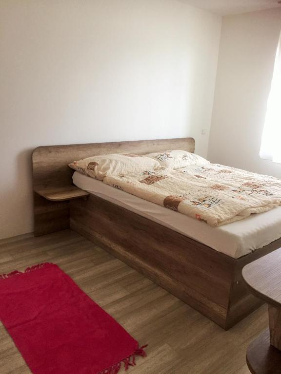 Postel nebo postele na pokoji v ubytování Promenád apartmány