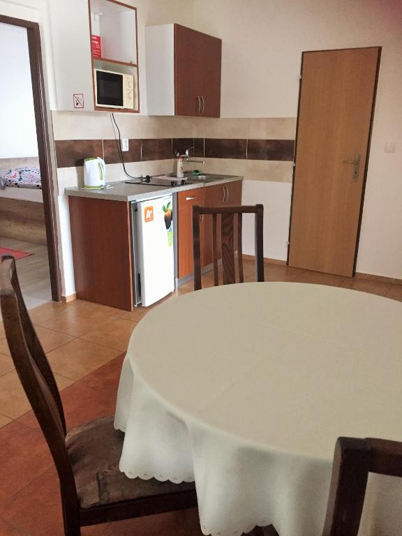 Kuchyň nebo kuchyňský kout v ubytování Promenád apartmány