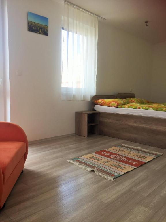 Postel nebo postele na pokoji v ubytování Promenád apartmány