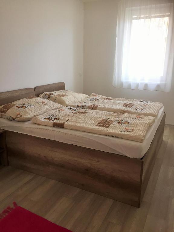 Postel nebo postele na pokoji v ubytování Promenád apartmány