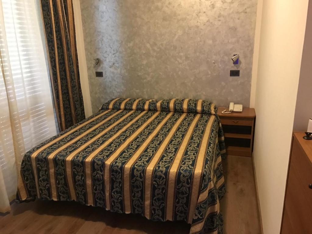 Postel nebo postele na pokoji v ubytování Hotel Nascente