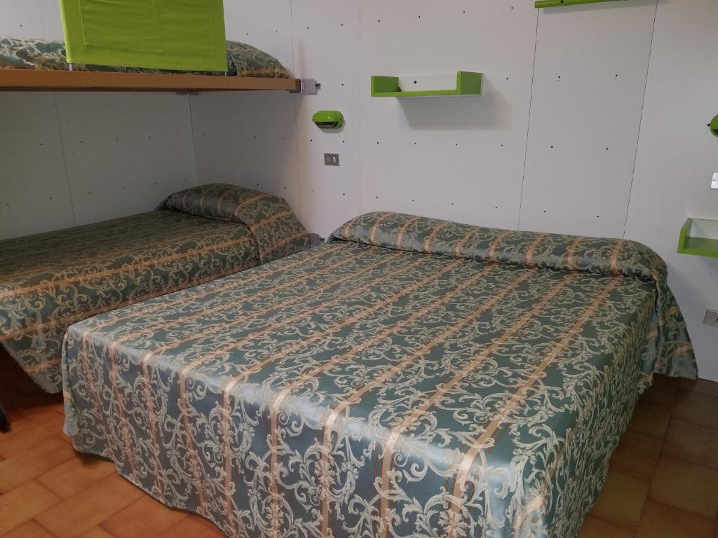 Postel nebo postele na pokoji v ubytování Hotel Nascente