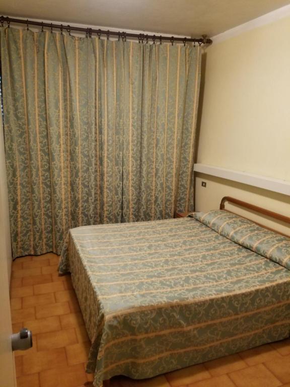 Postel nebo postele na pokoji v ubytování Hotel Nascente