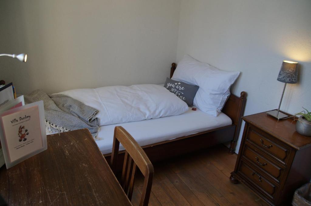 Postel nebo postele na pokoji v ubytování Villa Donkey BnB