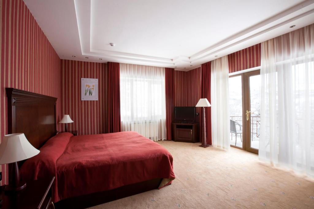 Postel nebo postele na pokoji v ubytování Hotel Dilijan Resort