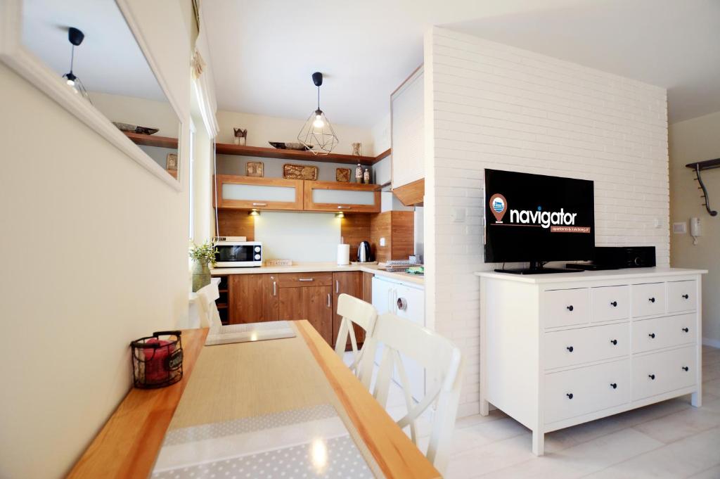 Kuchyňa alebo kuchynka v ubytovaní Apartamenty NAVIGATOR-PORT
