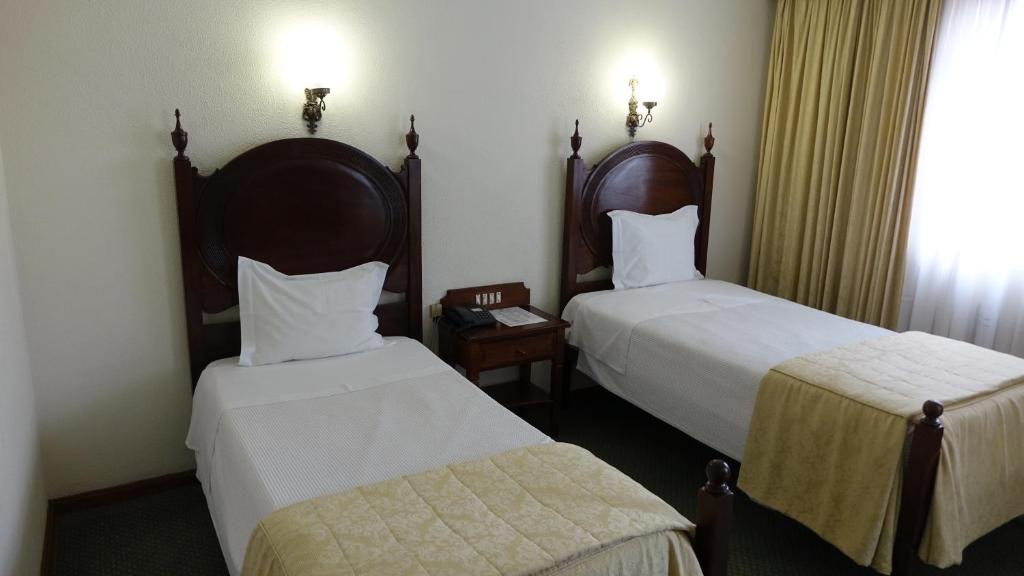 Cama o camas de una habitación en Hotel Imperial