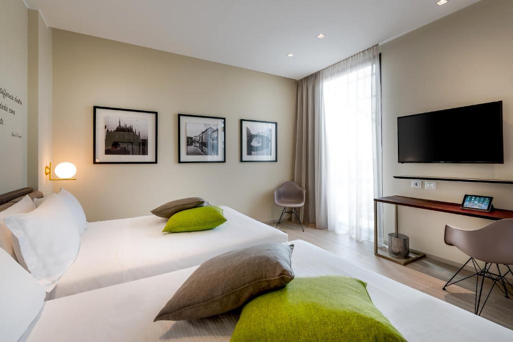 Postel nebo postele na pokoji v ubytování Hotel Canada