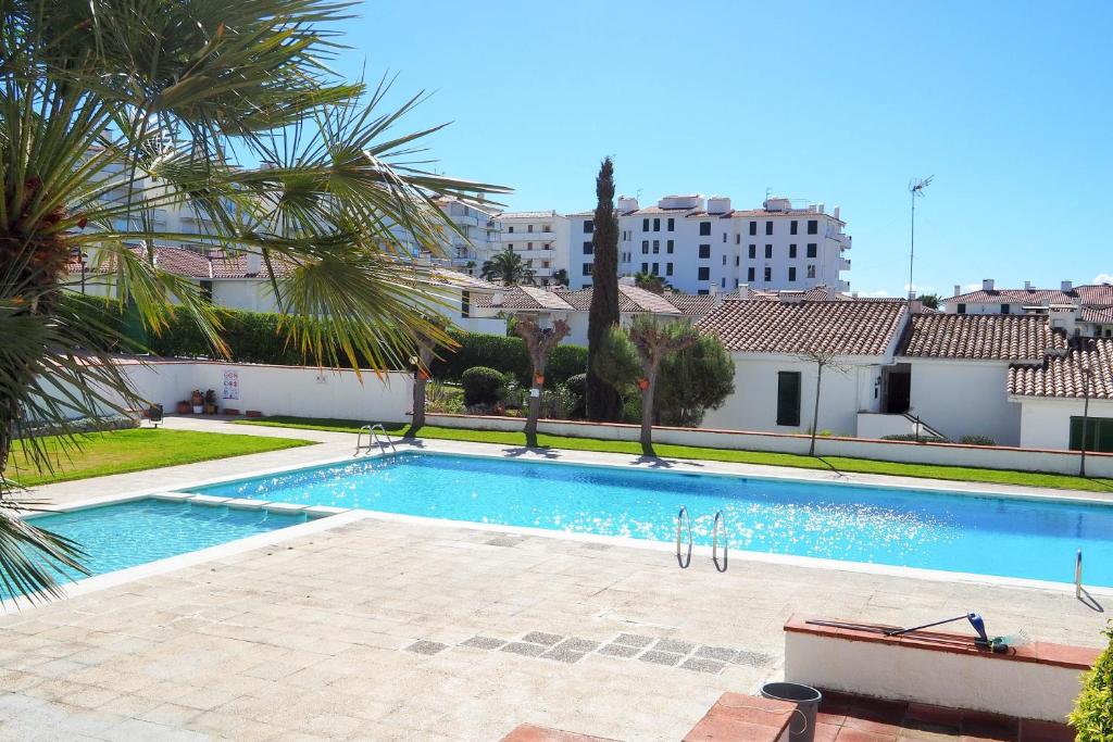 The swimming pool at or close to The Moon Studio by Hello Homes Sitges