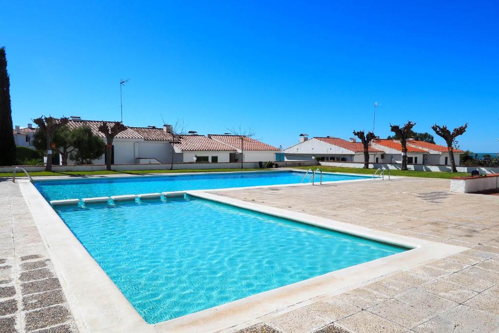 The swimming pool at or close to The Moon Studio by Hello Homes Sitges