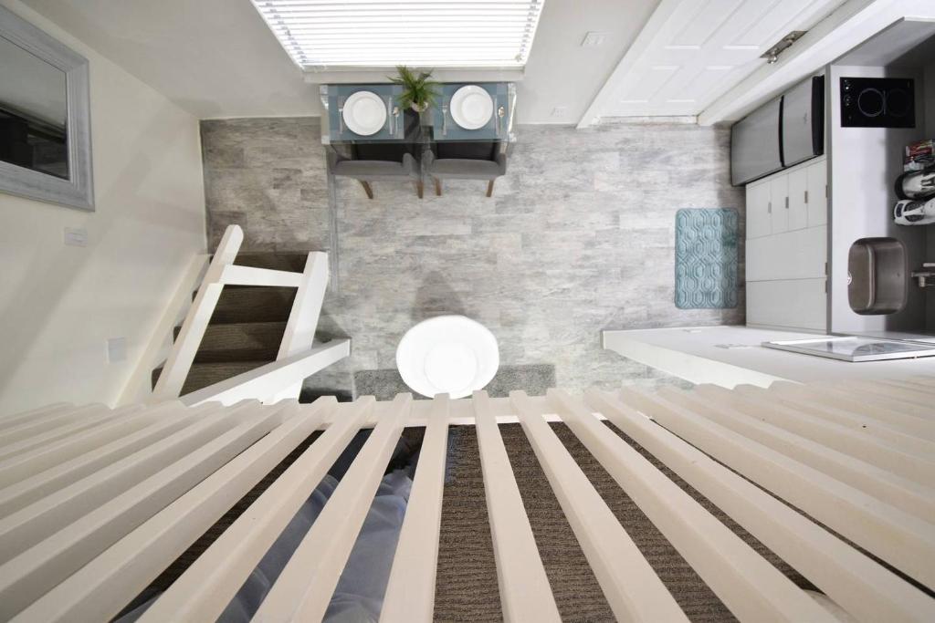 Postel nebo postele na pokoji v ubytování Fashionable loft APT UNIT # 5