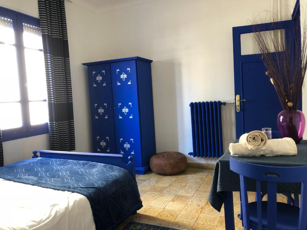 Postel nebo postele na pokoji v ubytování El Muniria