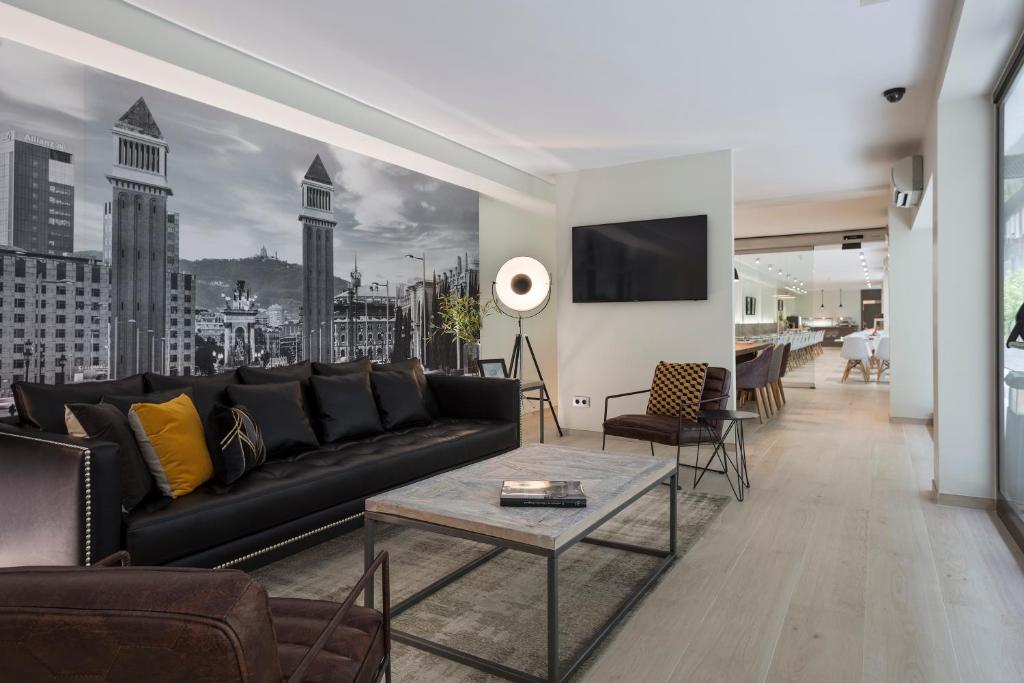 TV a/nebo společenská místnost v ubytování Aparthotel Bcn Montjuic