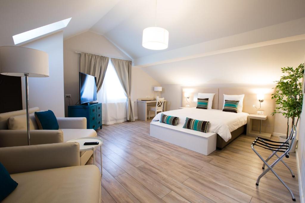 Postel nebo postele na pokoji v ubytování Auberge des Grands Bois