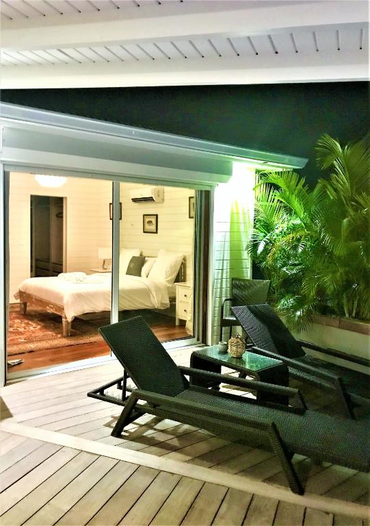 Coin salon dans l'établissement Villa La Voile Blanche