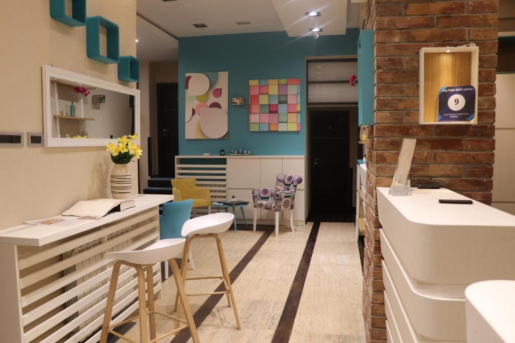 Area soggiorno di City Code In Joy