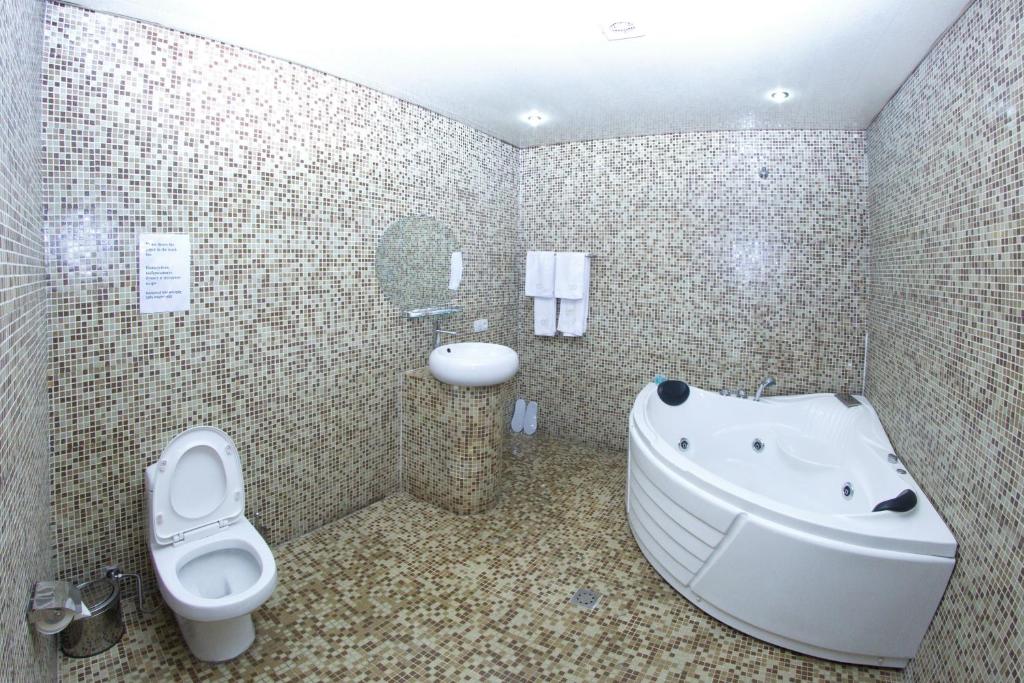 Koupelna v ubytování Venezia Palazzo Hotel