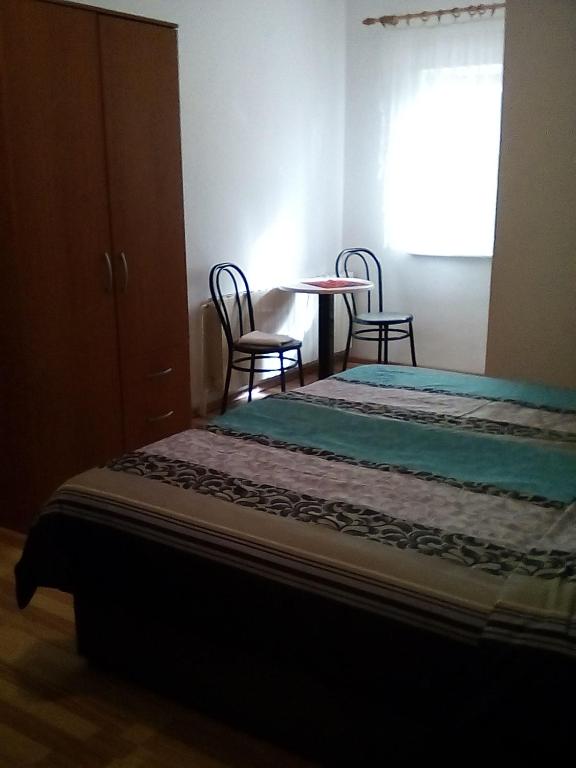 Llit o llits en una habitació de Sobe Braica