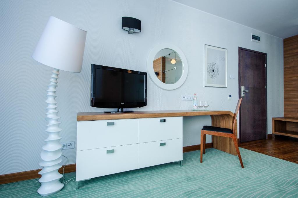 TV a/nebo společenská místnost v ubytování Hotel Active