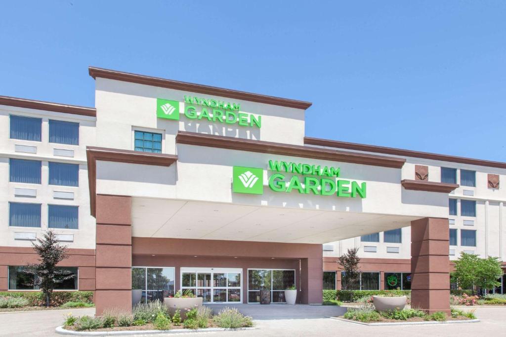 a rendering of the front of a hotel at Wyndham Garden Elk Grove Village - O'Hare in Elk Grove Village