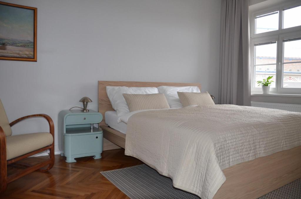 Postel nebo postele na pokoji v ubytování Apartmán u Masaryka
