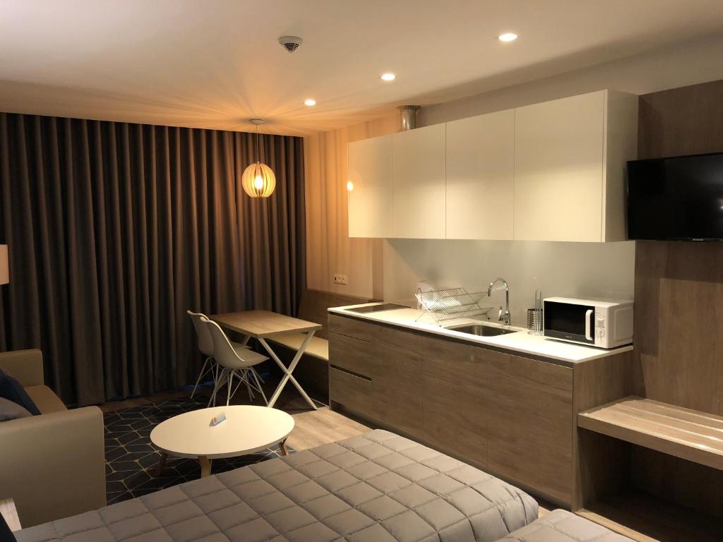 Kuchyň nebo kuchyňský kout v ubytování Hotel do Parque
