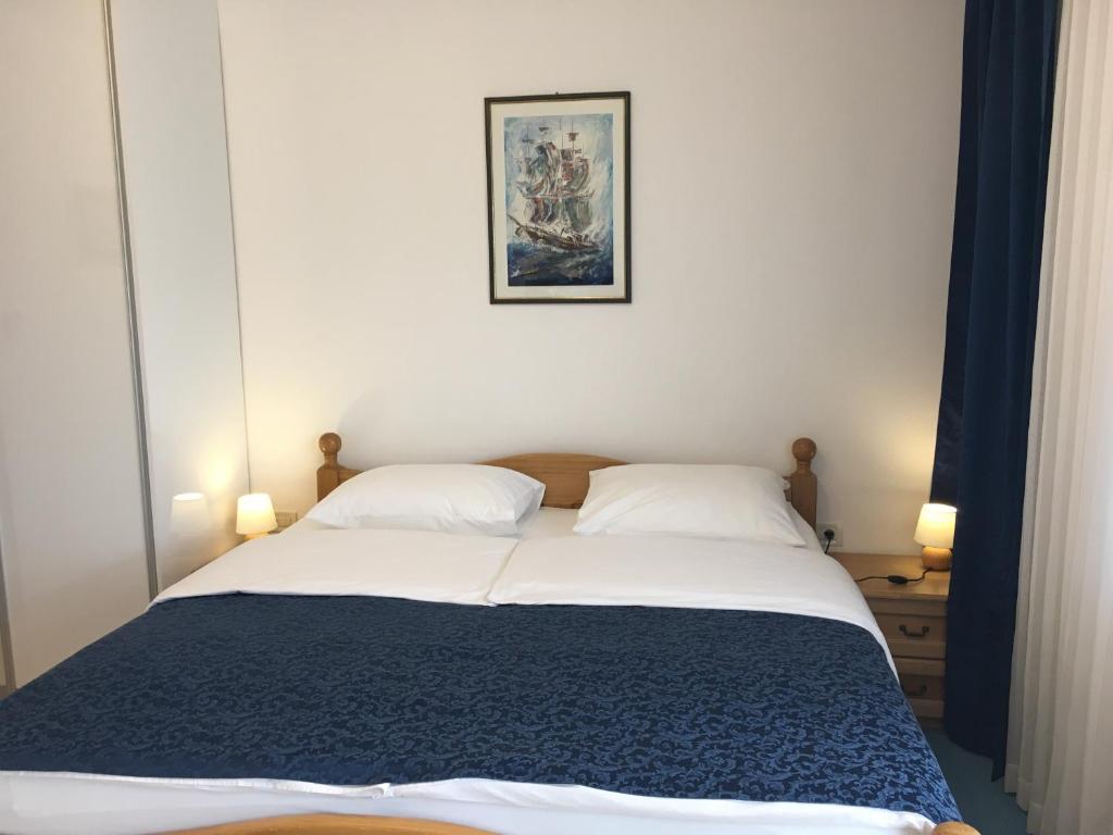 Posteľ alebo postele v izbe v ubytovaní Apartments Ursic