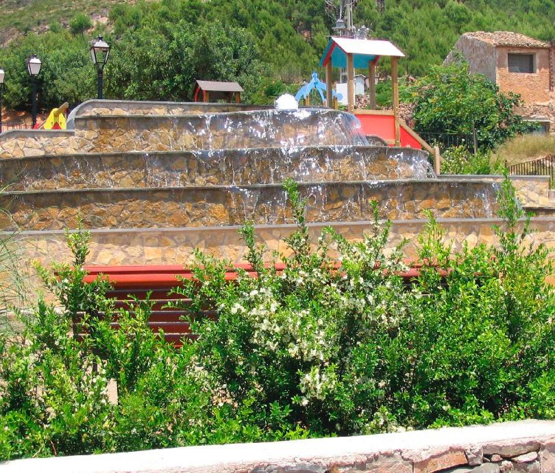 Jardín al aire libre en Apartamentos Rurales San Juan