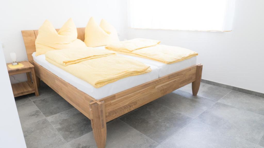 Postel nebo postele na pokoji v ubytování Kogelschneiderhof