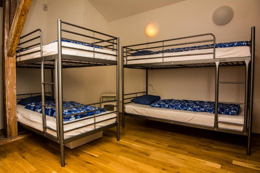 Postel nebo postele na pokoji v ubytování Onefam Míru