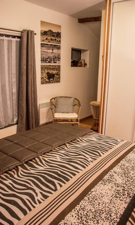 Postel nebo postele na pokoji v ubytování Belloréade Maison d'hôtes