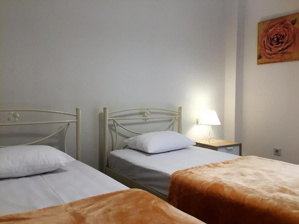 Postel nebo postele na pokoji v ubytování Rahona Villas