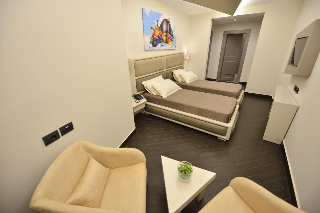 Uma área de estar em Petit Hotel Elita