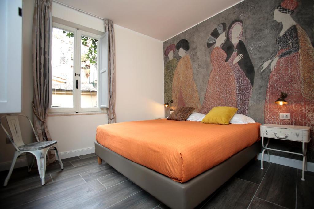 מיטה או מיטות בחדר ב-Trevi Contemporary Suite