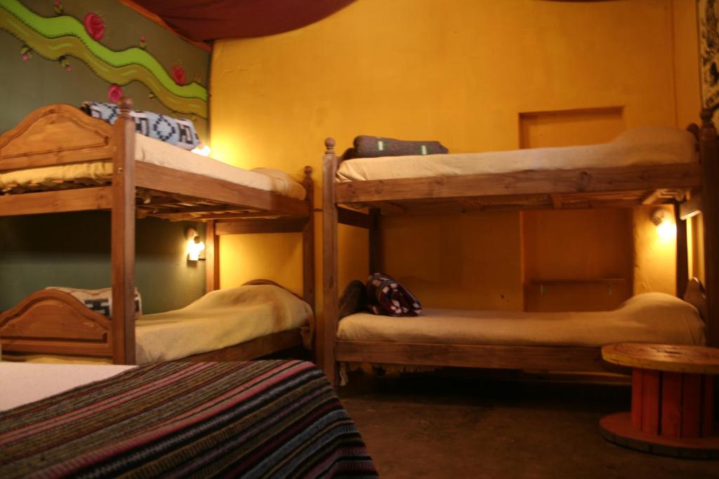 Postel nebo postele na pokoji v ubytování Hostel La Humahuacasa