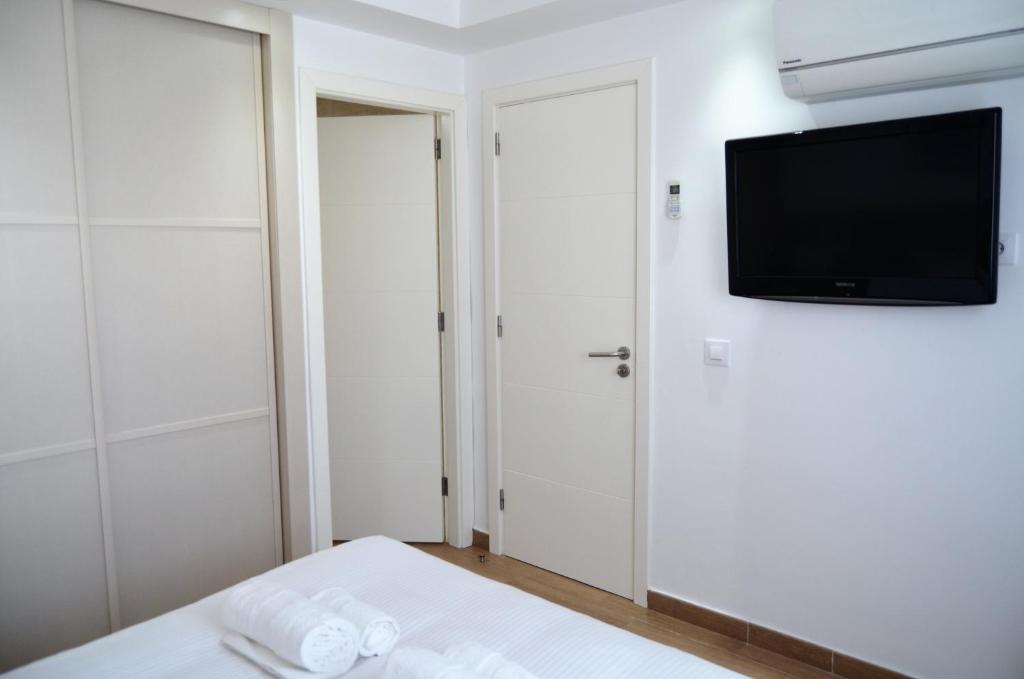Posteľ alebo postele v izbe v ubytovaní Bungalow ACK