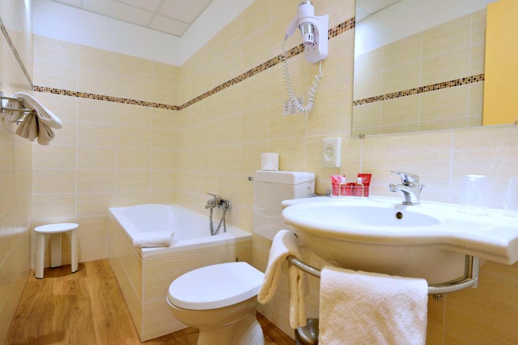 Koupelna v ubytování Hotel Capitole