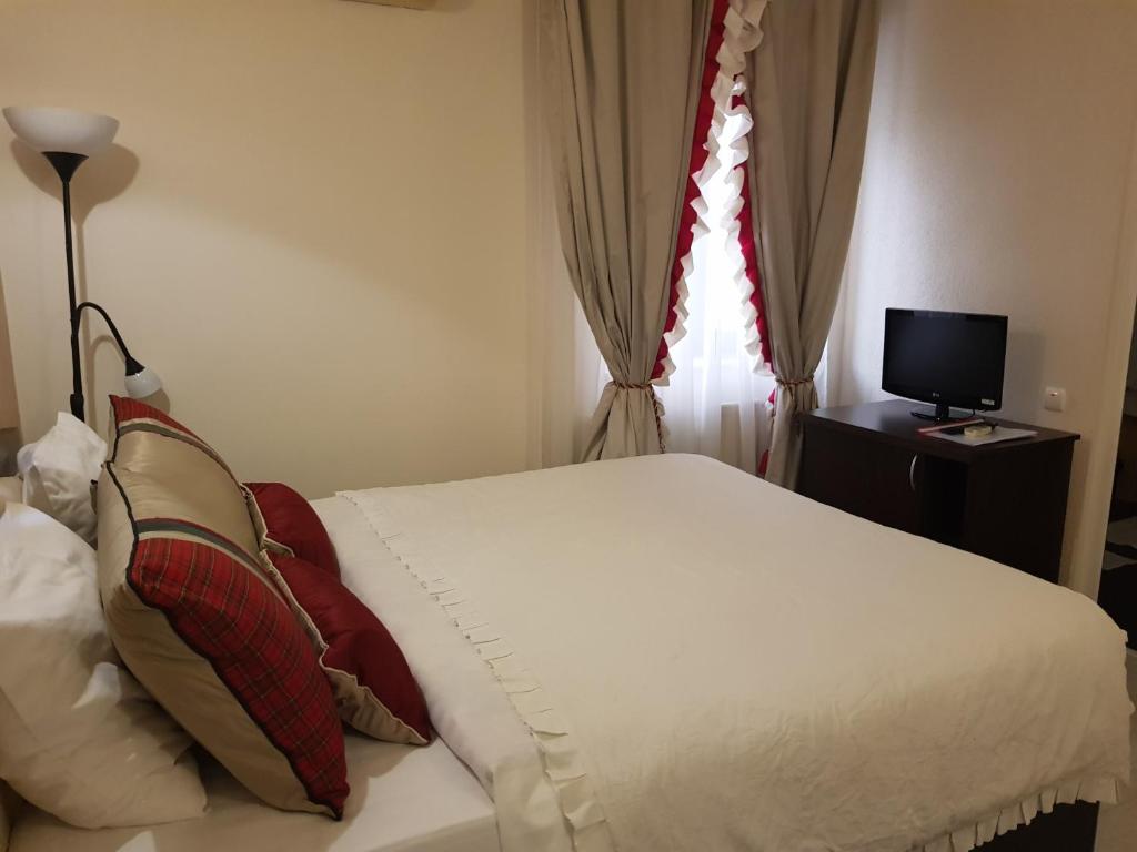TV a/nebo společenská místnost v ubytování Boutique Vila Paradis