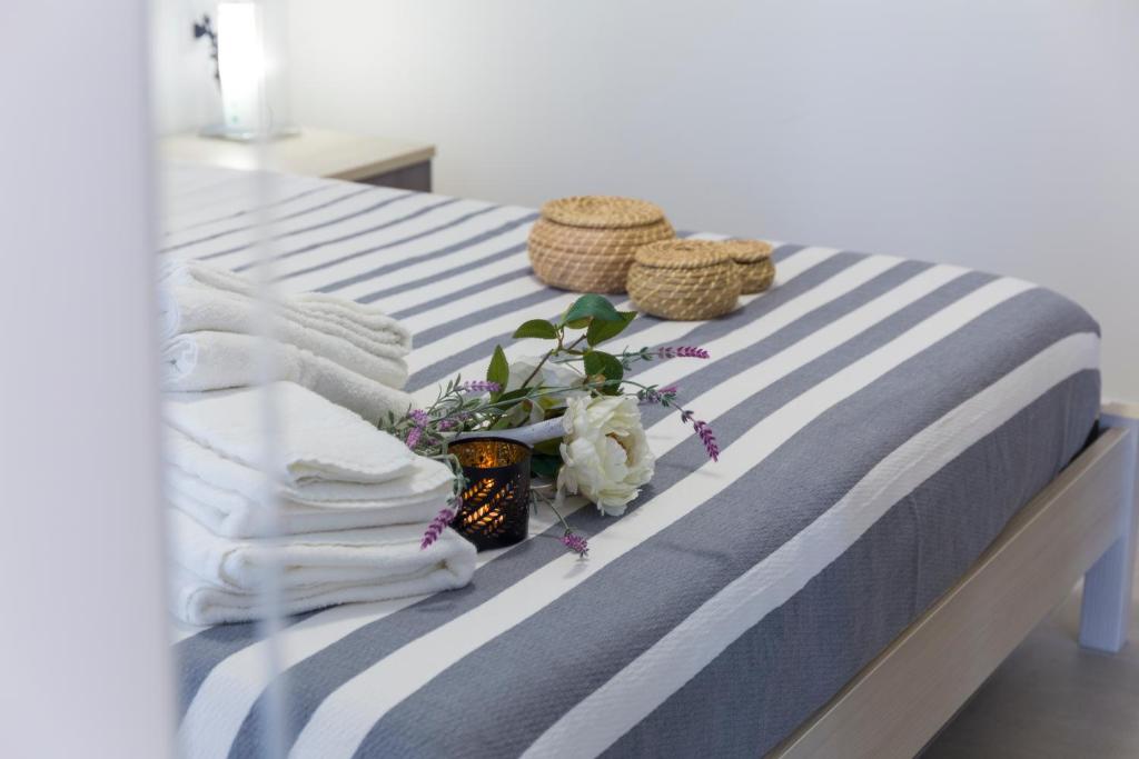 Katil atau katil-katil dalam bilik di MareinSicilia: Talia Residence