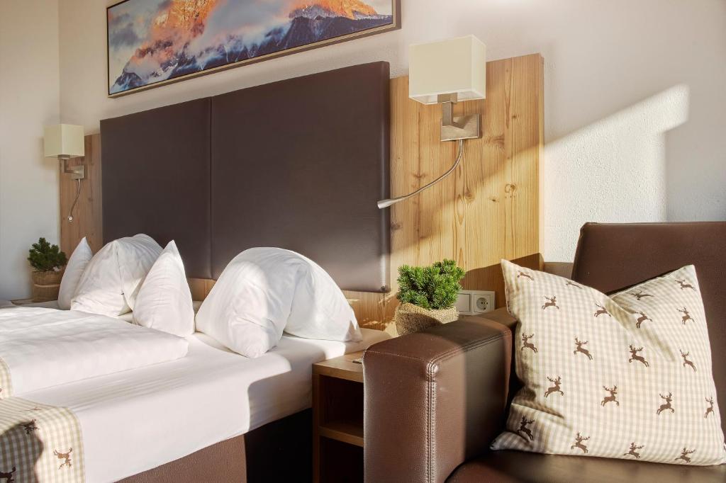 Postel nebo postele na pokoji v ubytování Hotel Venetblick