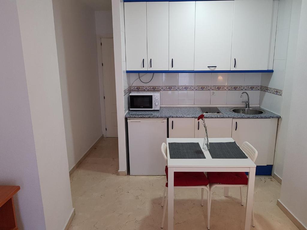 Kuchnia lub aneks kuchenny w obiekcie Fan Flat Mariscal