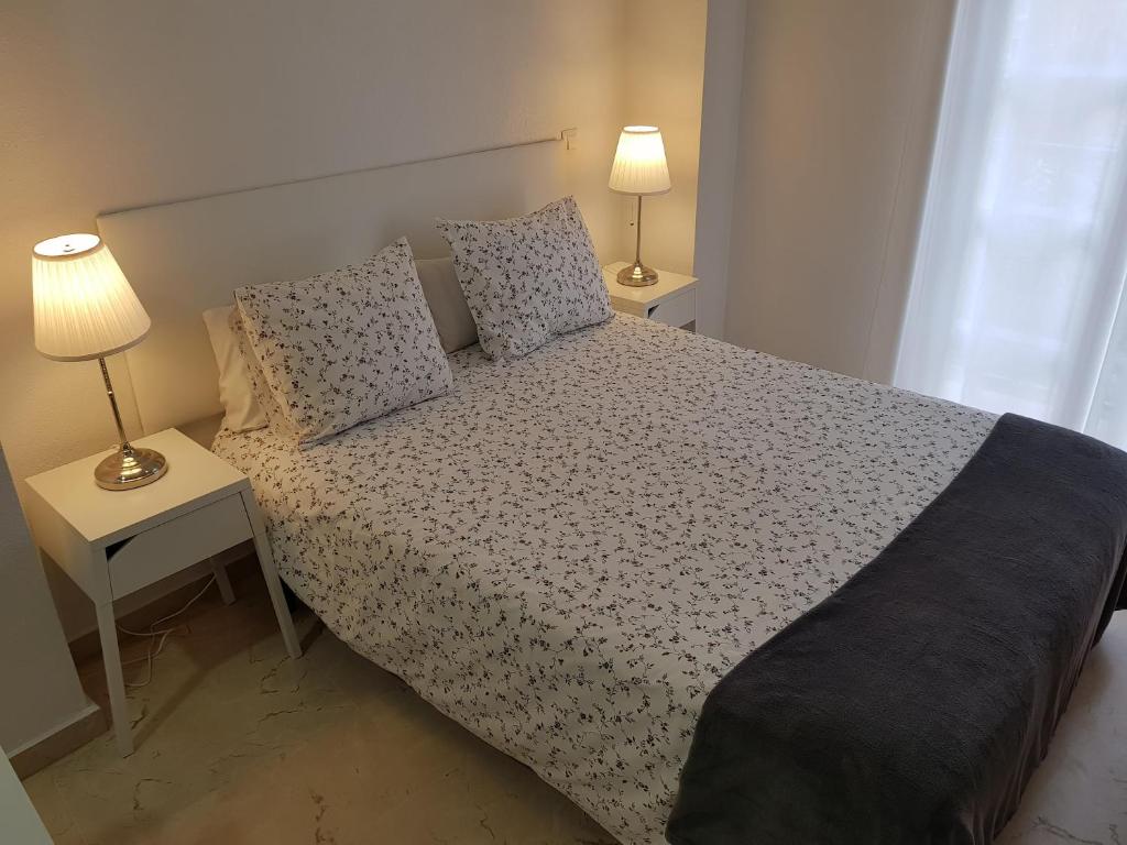 Łóżko lub łóżka w pokoju w obiekcie Fan Flat Mariscal