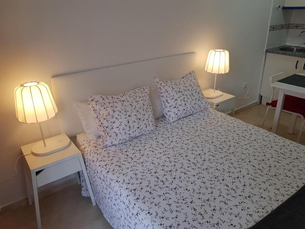 Łóżko lub łóżka w pokoju w obiekcie Fan Flat Mariscal