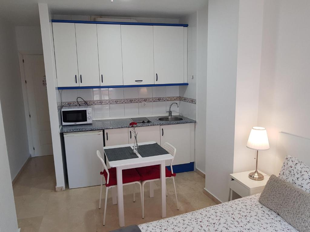 Kuchnia lub aneks kuchenny w obiekcie Fan Flat Mariscal