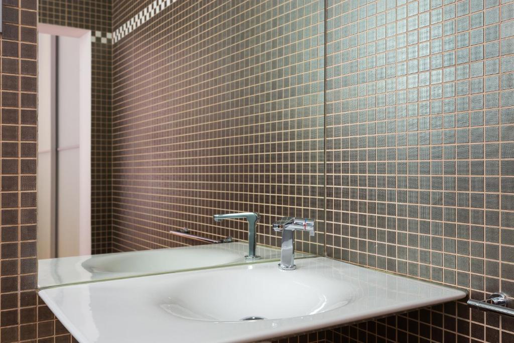 Kúpeľňa v ubytovaní Quartprimera Apartments