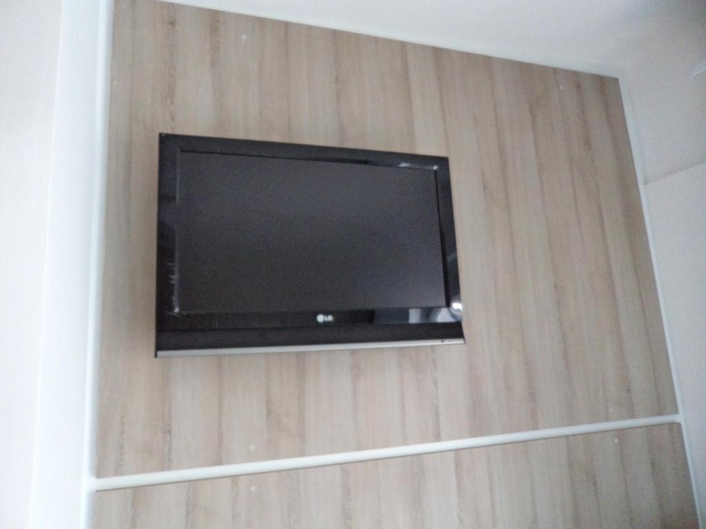 TV a/nebo společenská místnost v ubytování Rea Hotel