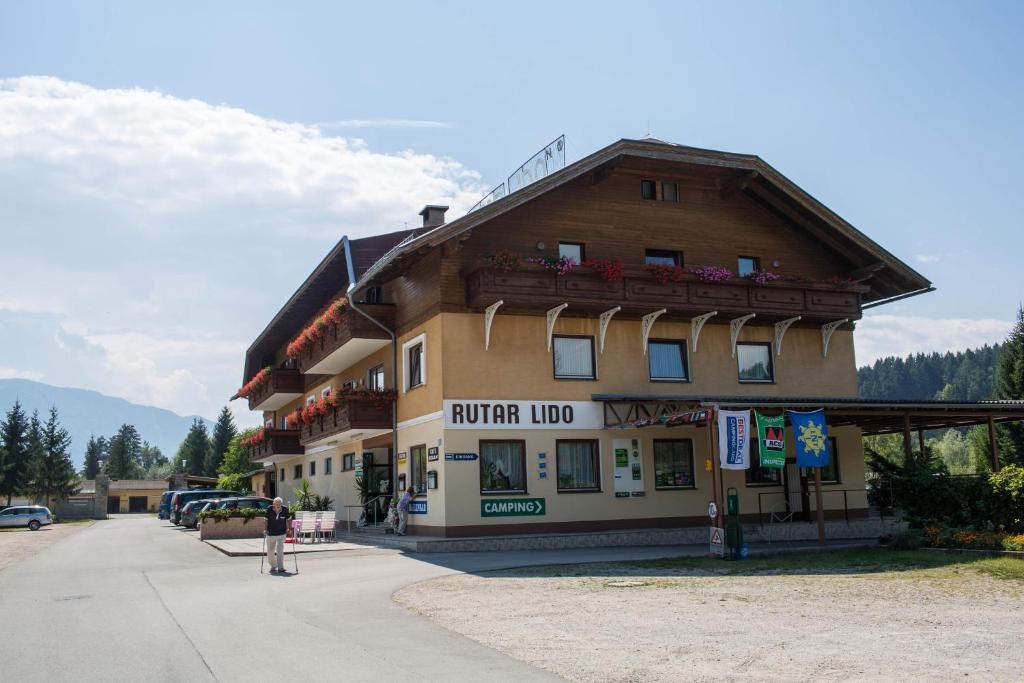 a building on the side of a street at Appartementhotel Rutar Lido in Eberndorf