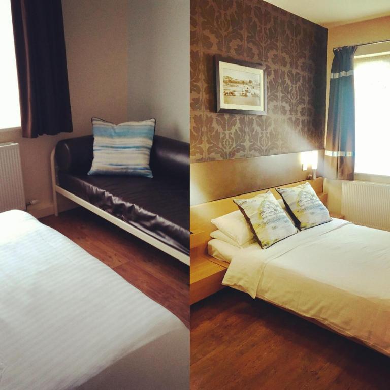 a hotel room with two beds and a couch at The Anchor Hotel & Bars in Ingoldmells