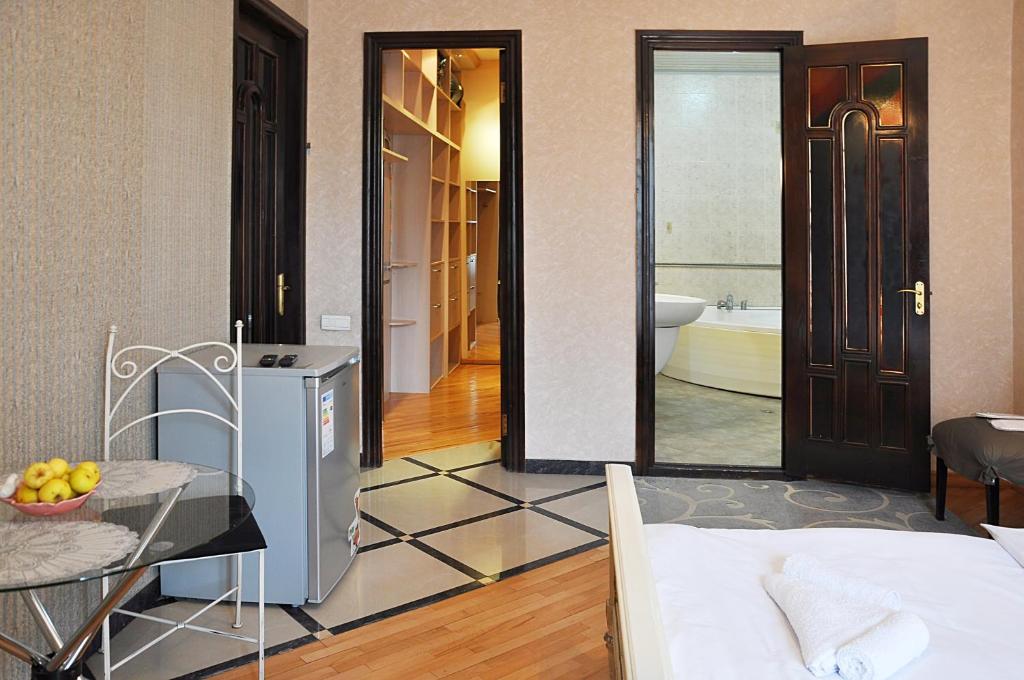 Postel nebo postele na pokoji v ubytování Hotel Gallery